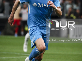 Napoli midfielder Scott McTominay (8) is in action during the Serie A football match number 5 between Juventus and Napoli in Turin, Piedmont...