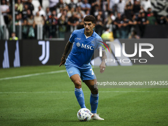 Napoli defender Giovanni Di Lorenzo (22) is in action during the Serie A football match number 5 between Juventus and Napoli in Turin, Piedm...