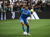 Napoli defender Giovanni Di Lorenzo (22) is in action during the Serie A football match number 5 between Juventus and Napoli in Turin, Piedm...