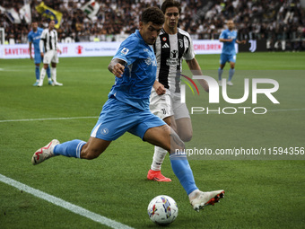 Napoli defender Giovanni Di Lorenzo (22) is in action during the Serie A football match number 5 between Juventus and Napoli in Turin, Piedm...