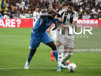 Napoli forward Romelu Lukaku (11) fights for the ball against Juventus midfielder Manuel Locatelli (5) during the Serie A football match num...