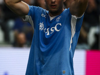 Napoli defender Amir Rrahmani (13) shows dejection during the Serie A football match number 5 between Juventus and Napoli in Turin, Piedmont...