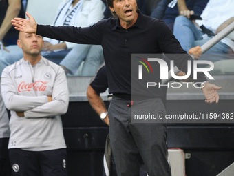 Napoli coach Antonio Conte gestures during the Serie A football match number 5 between Juventus and Napoli in Turin, Piedmont, Italy, on Sep...