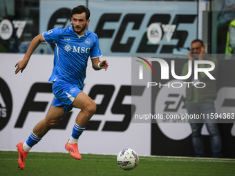 Napoli forward Khvicha K'varatskhelia (77) is in action during the Serie A football match number 5 between Juventus and Napoli in Turin, Pie...