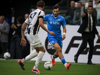 Napoli forward Khvicha K'varatskhelia (77) is in action during the Serie A football match number 5 between Juventus and Napoli in Turin, Pie...