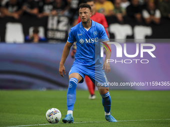 Napoli defender Amir Rrahmani (13) is in action during the Serie A football match number 5 between Juventus and Napoli in Turin, Piedmont, I...