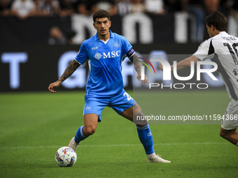 Napoli defender Giovanni Di Lorenzo (22) is in action during the Serie A football match number 5 between Juventus and Napoli in Turin, Piedm...