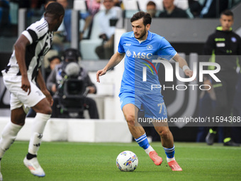 Napoli forward Khvicha K'varatskhelia (77) is in action during the Serie A football match number 5 between Juventus and Napoli in Turin, Pie...