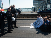 Several counter-protesters block the road for the ''Pro-Life March'' as thousands of people take part in the annual pro-life demonstration o...