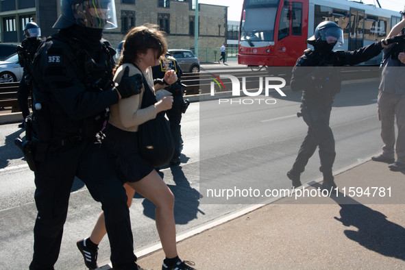 Police forcefully remove several counter-protesters who block the road for the ''Pro-Life March'' as thousands of people take part in the an...