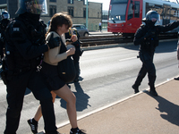 Police forcefully remove several counter-protesters who block the road for the ''Pro-Life March'' as thousands of people take part in the an...