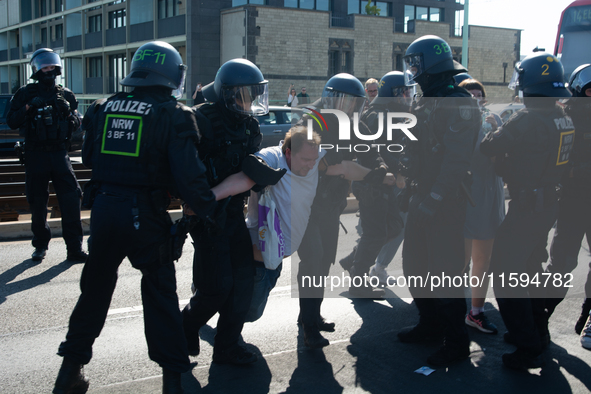 Police forcefully remove several counter-protesters who block the road for the ''Pro-Life March'' as thousands of people take part in the an...