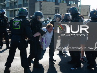 Police forcefully remove several counter-protesters who block the road for the ''Pro-Life March'' as thousands of people take part in the an...