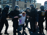 Police forcefully remove several counter-protesters who block the road for the ''Pro-Life March'' as thousands of people take part in the an...