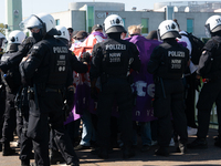 Police forcefully remove several counter-protesters who block the road for the ''Pro-Life March'' as thousands of people take part in the an...