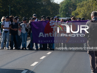 Several counter-protesters block the road for the ''Pro-Life March'' as thousands of people take part in the annual pro-life demonstration o...