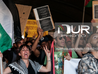 People attend a pro-Palestinian rally in Rome, Italy, on September 21, 2024. (