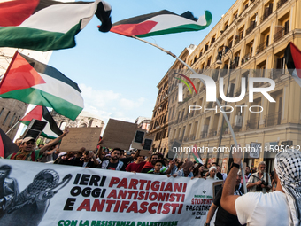 People attend a pro-Palestinian rally in Rome, Italy, on September 21, 2024. (