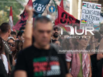 People attend a pro-Palestinian rally in Rome, Italy, on September 21, 2024. (