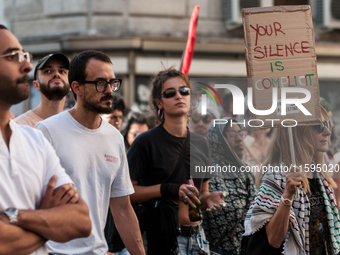 People attend a pro-Palestinian rally in Rome, Italy, on September 21, 2024. (