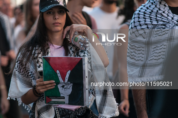 People attend a pro-Palestinian rally in Rome, Italy, on September 21, 2024. 