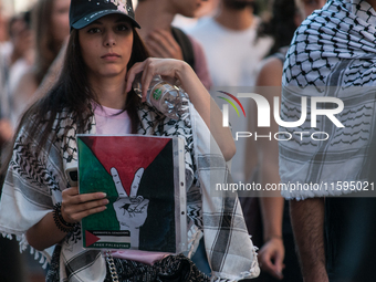 People attend a pro-Palestinian rally in Rome, Italy, on September 21, 2024. (