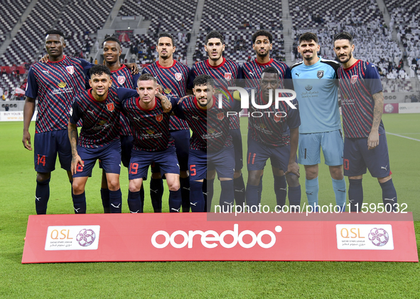 Al Duhail SC players pose for a team photo prior to the Ooredoo Qatar Stars League 24/25 match between Al-Sadd SC and Al Duhail SC at Khalif...