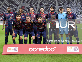 Al Duhail SC players pose for a team photo prior to the Ooredoo Qatar Stars League 24/25 match between Al-Sadd SC and Al Duhail SC at Khalif...