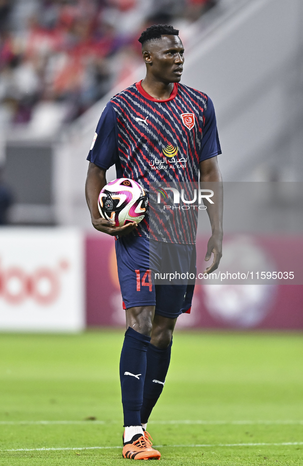 Michael Olunga of Al Duhail SC plays in the Ooredoo Qatar Stars League 24/25 match between Al-Sadd SC and Al Duhail SC at Khalifa Internatio...