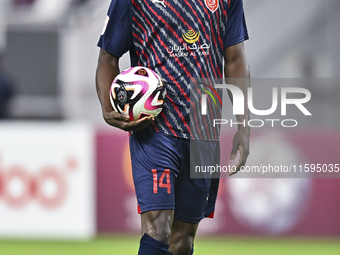 Michael Olunga of Al Duhail SC plays in the Ooredoo Qatar Stars League 24/25 match between Al-Sadd SC and Al Duhail SC at Khalifa Internatio...