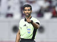 Referee Khamis Mohammed Al-Marri gestures during the Ooredoo Qatar Stars League 24/25 match between Al-Sadd SC and Al Duhail SC at Khalifa I...