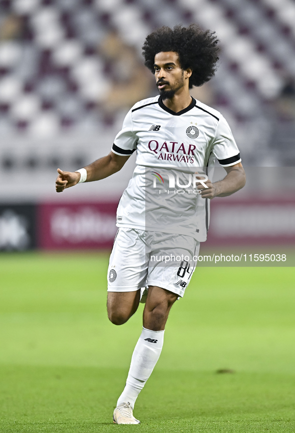 Akram Hassan Afif of Al Sadd SC plays in the Ooredoo Qatar Stars League 24/25 match between Al Sadd SC and Al Duhail SC at Khalifa Internati...