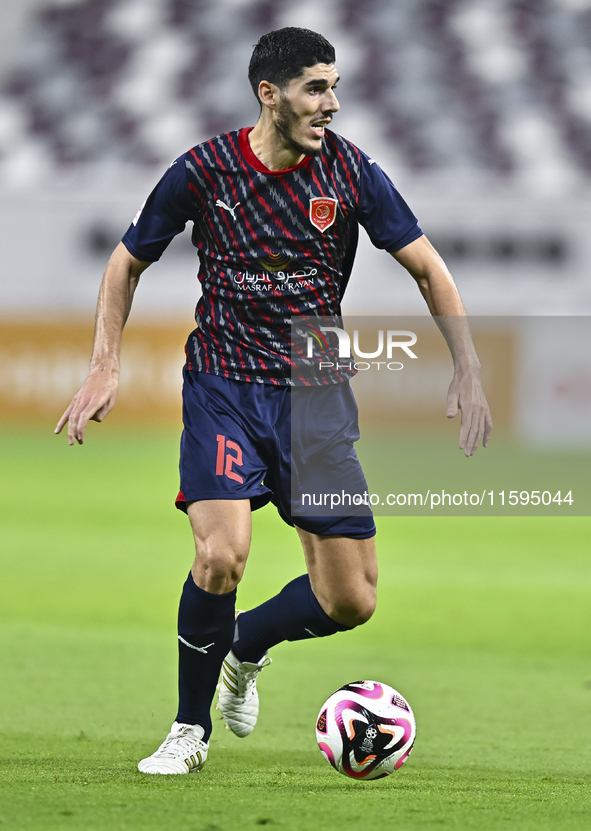 Karim Buddaif of Al Duhail SC plays in the Ooredoo Qatar Stars League 24/25 match between Al-Sadd SC and Al Duhail SC at Khalifa Internation...