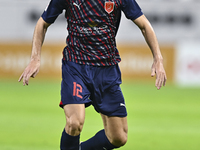 Karim Buddaif of Al Duhail SC plays in the Ooredoo Qatar Stars League 24/25 match between Al-Sadd SC and Al Duhail SC at Khalifa Internation...