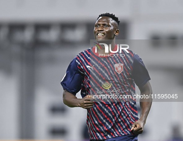 Michael Olunga of Al Duhail SC celebrates after scoring a goal during the Ooredoo Qatar Stars League 24/25 match between Al-Sadd SC and Al D...