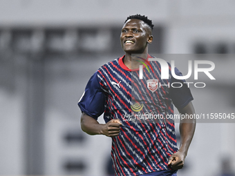 Michael Olunga of Al Duhail SC celebrates after scoring a goal during the Ooredoo Qatar Stars League 24/25 match between Al-Sadd SC and Al D...