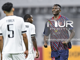 Michael Olunga of Al Duhail SC celebrates after scoring a goal during the Ooredoo Qatar Stars League 24/25 match between Al-Sadd SC and Al D...