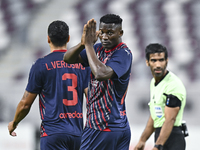 Michael Olunga of Al Duhail SC celebrates after scoring a goal during the Ooredoo Qatar Stars League 24/25 match between Al-Sadd SC and Al D...