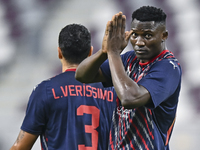 Michael Olunga of Al Duhail SC celebrates after scoring a goal during the Ooredoo Qatar Stars League 24/25 match between Al-Sadd SC and Al D...