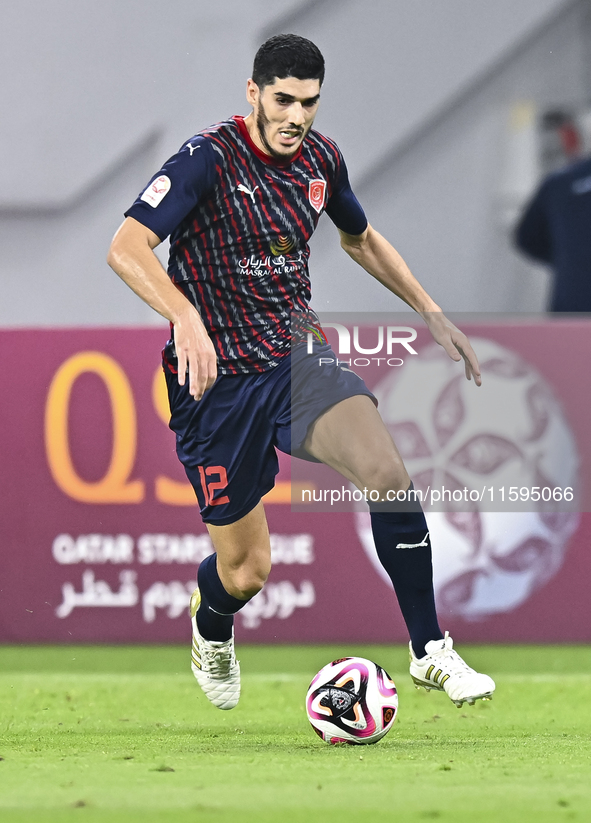 Karim Buddaif of Al Duhail SC plays in the Ooredoo Qatar Stars League 24/25 match between Al-Sadd SC and Al Duhail SC at Khalifa Internation...