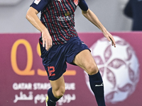 Karim Buddaif of Al Duhail SC plays in the Ooredoo Qatar Stars League 24/25 match between Al-Sadd SC and Al Duhail SC at Khalifa Internation...