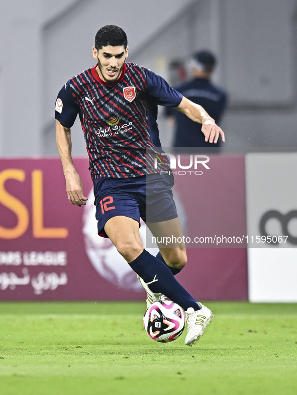 Karim Buddaif of Al Duhail SC plays in the Ooredoo Qatar Stars League 24/25 match between Al-Sadd SC and Al Duhail SC at Khalifa Internation...