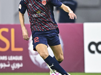 Karim Buddaif of Al Duhail SC plays in the Ooredoo Qatar Stars League 24/25 match between Al-Sadd SC and Al Duhail SC at Khalifa Internation...