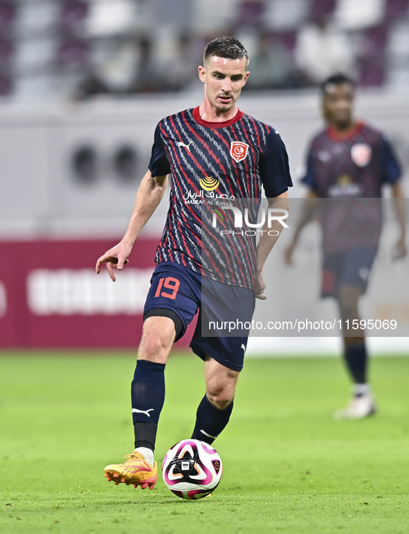 Benjamin Bourigeaud of Al Duhail SC plays in the Ooredoo Qatar Stars League 24/25 match between Al-Sadd SC and Al Duhail SC at Khalifa Inter...