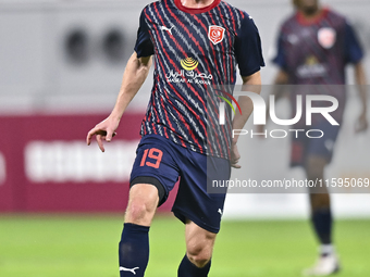 Benjamin Bourigeaud of Al Duhail SC plays in the Ooredoo Qatar Stars League 24/25 match between Al-Sadd SC and Al Duhail SC at Khalifa Inter...