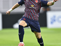 Bassam Hisham of Al Duhail SC plays in the Ooredoo Qatar Stars League 24/25 match between Al-Sadd SC and Al Duhail SC at Khalifa Internation...