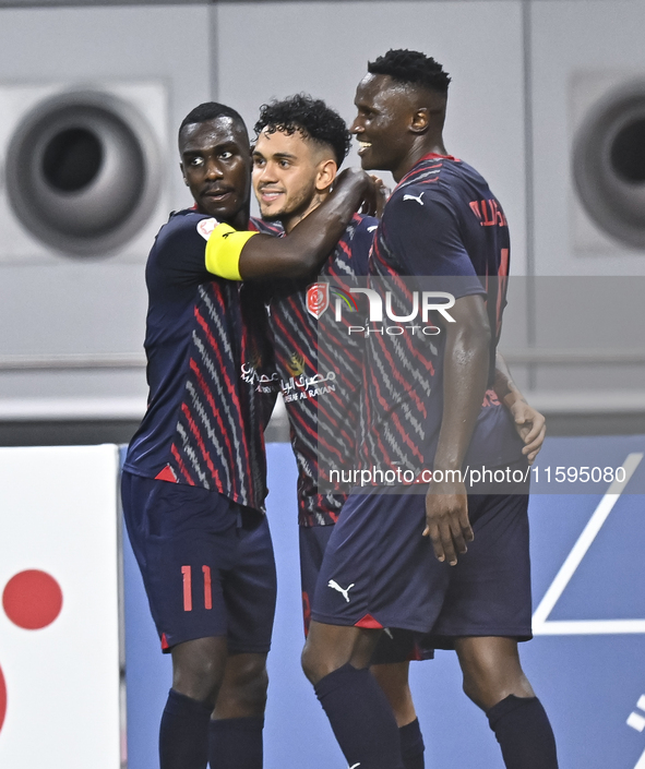 Edmilson Junior Paulo (C) of Al Duhail SC celebrates after scoring a goal during the Ooredoo Qatar Stars League 24/25 match between Al-Sadd...