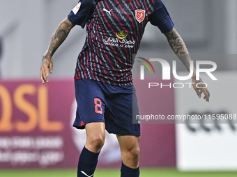 Edmilson Junior Paulo of Al Duhail SC plays in the Ooredoo Qatar Stars League 24/25 match between Al-Sadd SC and Al Duhail SC at Khalifa Int...