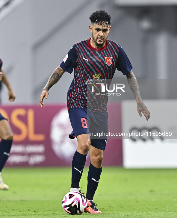 Edmilson Junior Paulo of Al Duhail SC plays in the Ooredoo Qatar Stars League 24/25 match between Al-Sadd SC and Al Duhail SC at Khalifa Int...