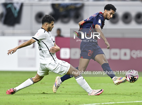 Abdulla Badr Alyazidi (L) of Al-Sadd SC battles for the ball with Homam El Amin (R) during the Ooredoo Qatar Stars League 24/25 match betwee...